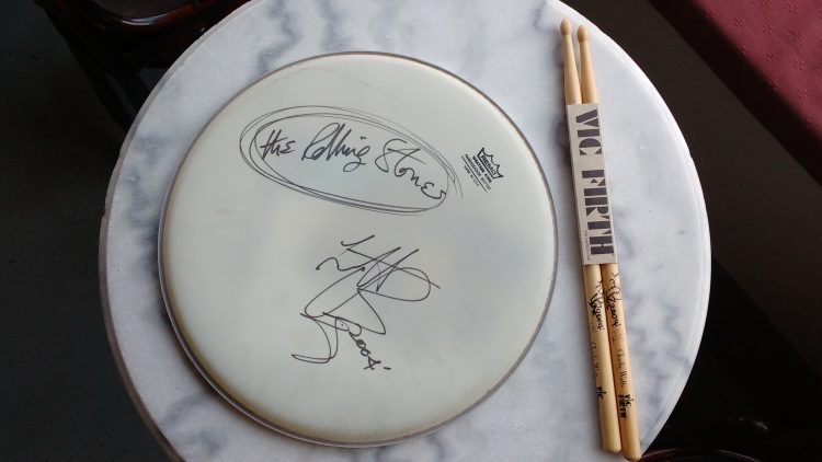 Charlie Watts Signed Drumhead and Sticks